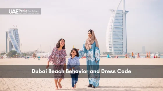Woman and children dressed modestly on Dubai beach with iconic skyline.