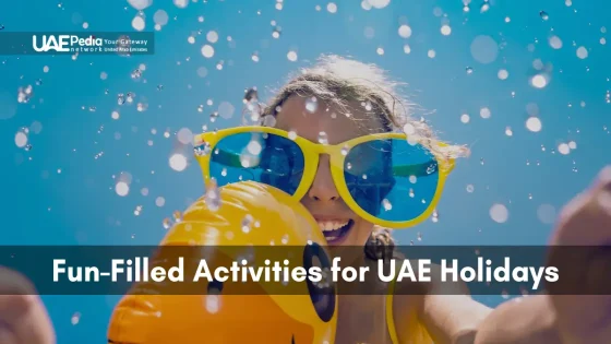 A happy child wearing sunglasses and playing in the water, celebrating UAE holidays.