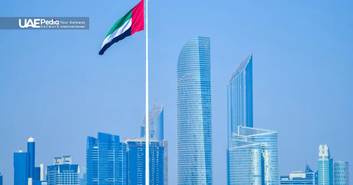 UAE flag flying over modern skyscrapers, symbolizing national progress.