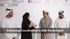 Group of UAE officials talking to enhance coordination across government agencies.