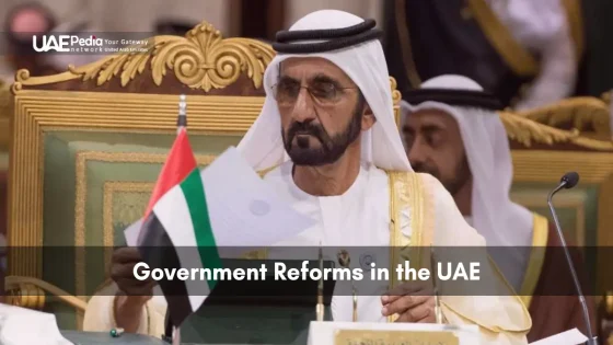 Sheikh Mohammed bin Rashid in gold-trimmed kandura reads documents beside a UAE flag at a summit