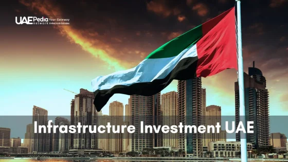 UAE flag flying over modern skyscrapers, highlighting infrastructure investments.