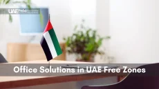 A workspace with a UAE flag, representing office solutions in UAE Free Zones.