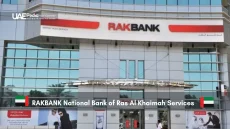 Front view of RAKBANK building with clear branding signage