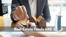 Businessperson handing keys, symbolizing UAE real estate fund investments.