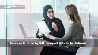 Two women discussing documents in an office setting