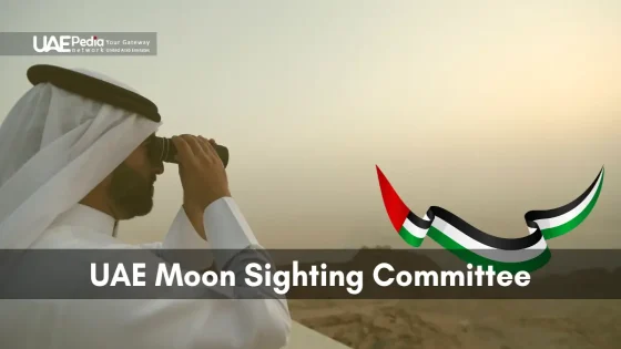 A member of the UAE Moon Sighting Committee uses binoculars to look at the moon in the UAE.