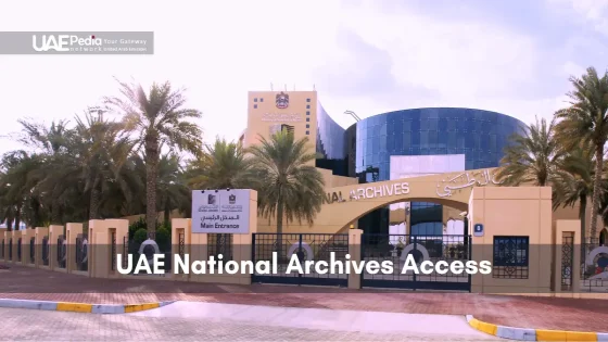 The main entrance of the UAE National Archives is surrounded by palm trees.