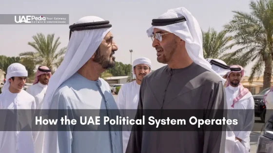 UAE officials wearing kanduras and ghutras talking with palm trees in background.