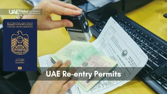 Hand stamping a re-entry permit form into a UAE passport on a desk beside documents.