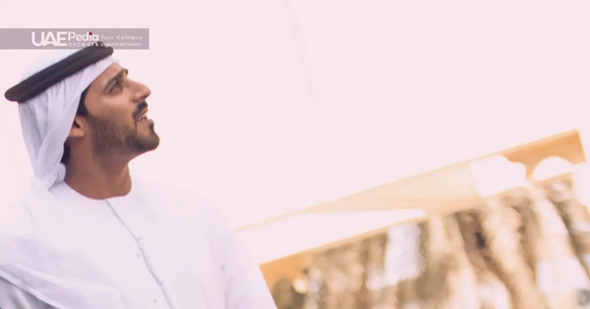 A man looking up while enjoying the UAE's cultural exchange holiday activities.