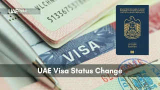 Detailed view of UAE passport and visa page with a pen, symbolizing status change.