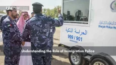 UAE police officers in uniform speaking with civilians