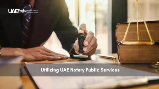 Person stamping legal documents at a notary office