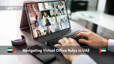Virtual meeting with diverse team members on a monitor.
