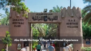 Visitors entering the UAE Heritage Village through the main gate