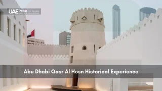 Historic Qasr Al Hosn fort in Abu Dhabi with modern buildings behind