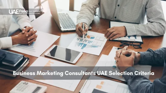 Team of consultants analyzing reports and marketing data at a table