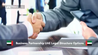 Handshake in business setting with legal documents