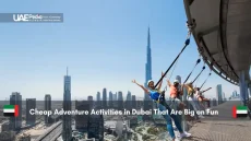 Group ziplining above Dubai skyline with Burj Khalifa view
