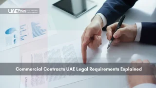 Person signing a commercial contract in UAE