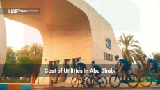 Cyclists riding past ERTH building in Abu Dhabi