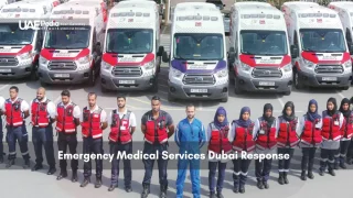 Dubai emergency medical team standing in front of ambulances