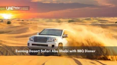 SUV driving through sand during Abu Dhabi desert safari