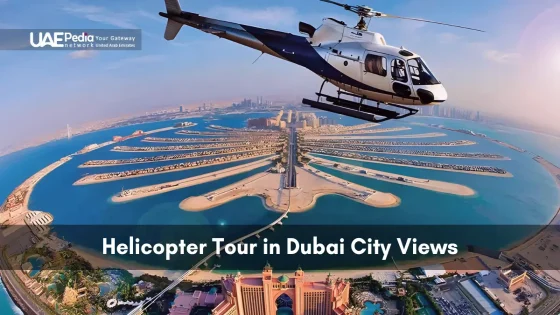 White helicopter hovering above Palm Jumeirah island with Dubai skyline and Arabian Gulf below
