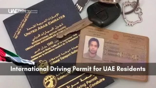 International driving permit for UAE residents with ID, passport, and keys.