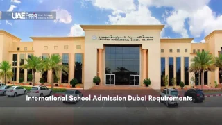 Front view of Emirates International School with parked cars