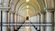 Ornate Islamic-style archway with columns and lamps