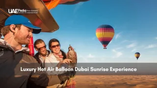 People enjoying a hot air balloon ride over Dubai’s desert at sunrise