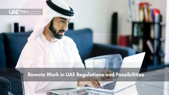 A man working from home with a laptop in the UAE.
