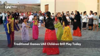 Emirati children in traditional dress playing outdoors