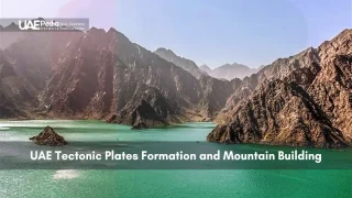 Rocky mountains and green lake in the UAE
