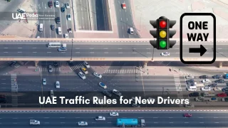 Aerial shot showing traffic lights and a one-way sign in UAE for new drivers.