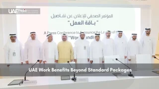 UAE officials at a press conference on new work benefit packages