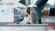 Office workers exploring technological trends in UAE