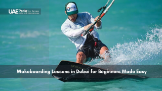 Man wakeboarding in turquoise waters during lesson in Dubai