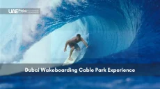 Person wakeboarding at a cable park in Dubai.