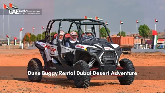 Group in a Polaris dune buggy during Dubai desert tour