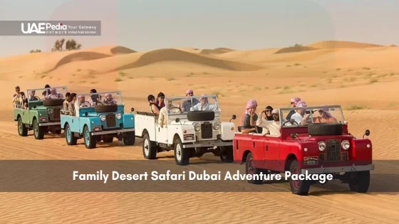A family in vintage vehicles driving through the desert on a safari.