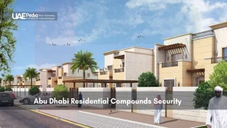 Gated Abu Dhabi residential compound with villas and palm trees
