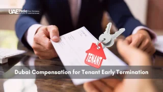 Person’s hand passing tenant keychain and lease contract on desk in office environment