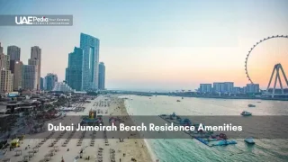 View of Jumeirah Beach Residence and Ain Dubai at sunset