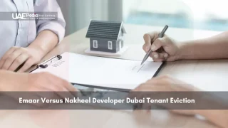 Hands signing tenant eviction document with house model on desk