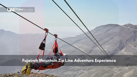Person zip lining over rocky mountains in Fujairah