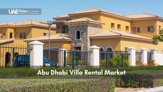 Spacious yellow villa in Abu Dhabi surrounded by a metal fence.