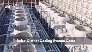 Multiple industrial chillers and interconnecting insulated pipes at a Dubai cooling facility.